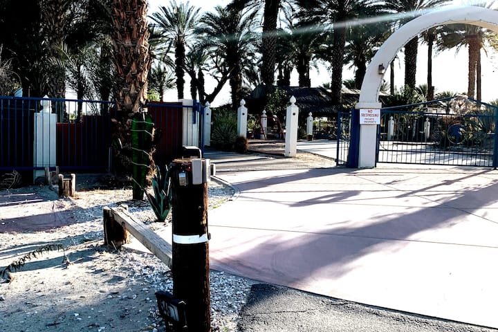 A parking meter sitting on the side of a road.